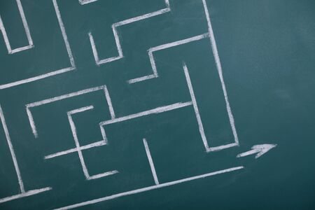 Maze drawn on a blackboardの写真素材
