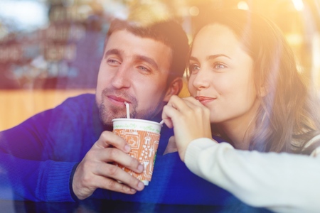 A happy loving couple enjoying breakfastの写真素材