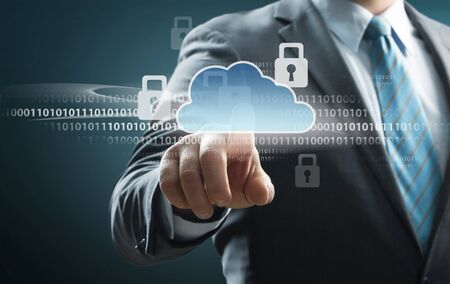 Cloud computing concept - connect to cloud. Businessman or information technologist click on cloud...