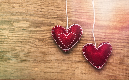 Heart shape on wooden backgroundの写真素材