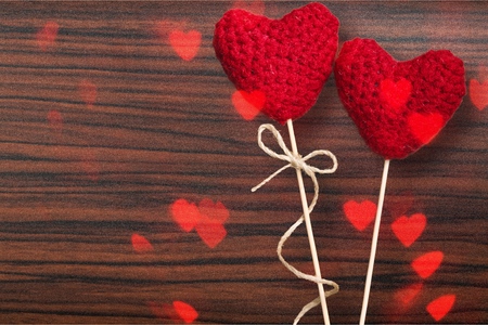 Love hearts on wooden deskの写真素材