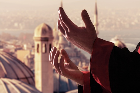 Silhouette hand prayingの写真素材