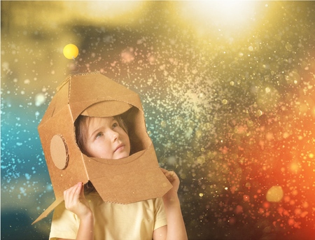 child in an astronaut costumeの写真素材