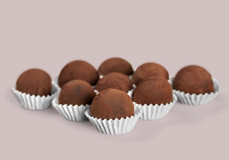 Chocolate candies collection. Beautiful Belgian truffles isolated on white background