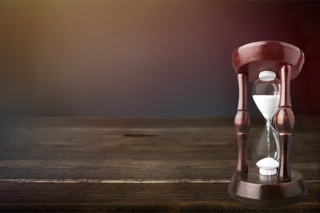 Hourglass on table