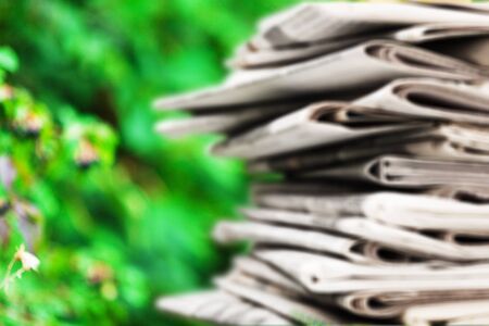 Newspapers close up background