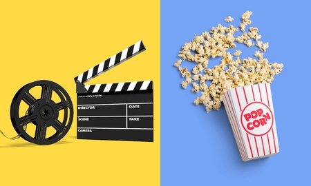 Filmmaker profession. Clapperboard on yellow background top view copyspaceの写真素材