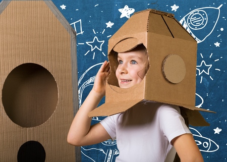 child is dressed in an astronaut costumeの写真素材