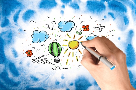 Woman's Hand draws a bicycleの写真素材