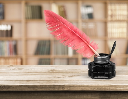 Vintage old quill pen with inkwellの写真素材