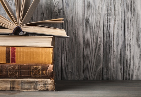 Education concept - books on the desk in the auditoriumの写真素材