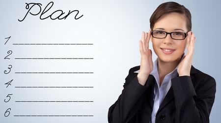 businesswoman writing blank plan listの写真素材