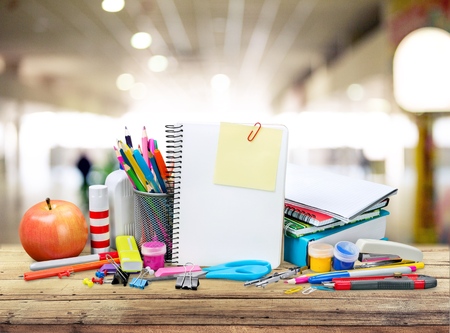 School books ,color pencil ,pen on desk,can creative infographics blackboard inside , the education...