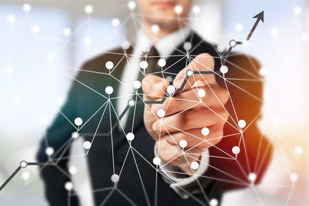 Businessman drawing  on digital screen