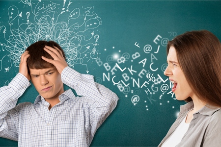 Man talking to an attractive woman with question mark