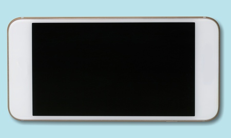 Smartphone on blue backgroundの写真素材