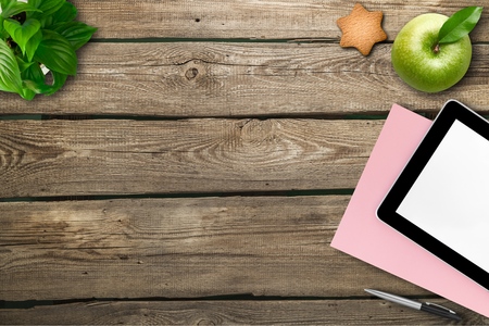 Top or flat lay view of stationery on wooden background with copy space. Back to school concept.の写真素材