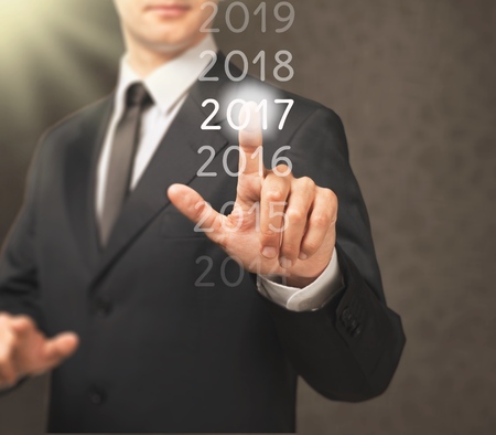 Businessman welcome year 2017. Business new year card concept / soft focus picture / Vintage conceptの写真素材