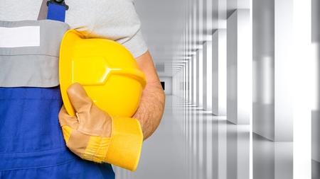 Worker and dark texture in background. Concept of OSH (occupational safety and health)