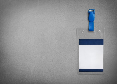 Blank badge mockup isolated on grey backgroundの写真素材