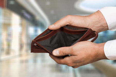 Empty wallet in the hand