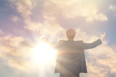 Man happy with hands rise up