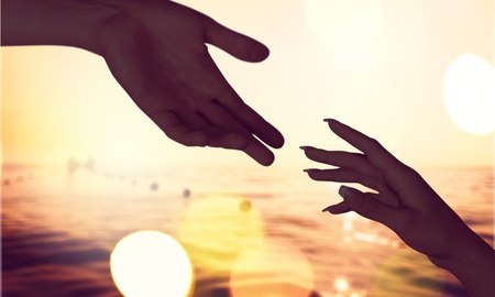silhouette of hand help and hope conceptの写真素材
