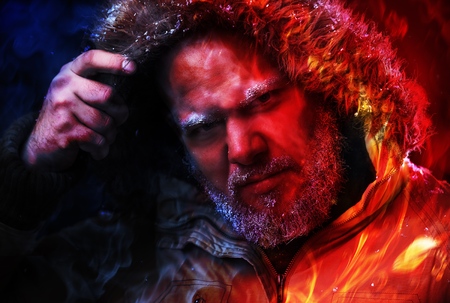 Side view portrait of thinking stylish young man looking awayの写真素材