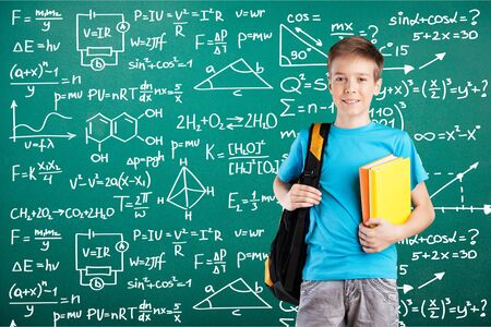 School boy and blackboard