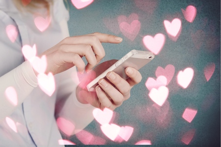 Beautiful happy woman sending message