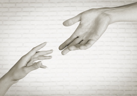 Giving a helping handの写真素材