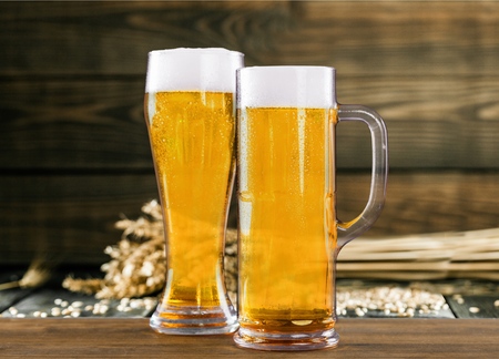 Glasses of beer on tabletの写真素材