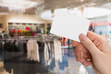 Credit card in human hand