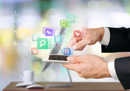 digital tablet in hand and email icon