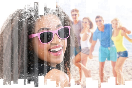 summer, holidays, vacation, happy people concept - group of friends having fun on the beachの写真素材