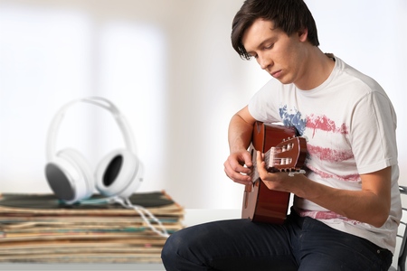 Man playing classical guitarの写真素材