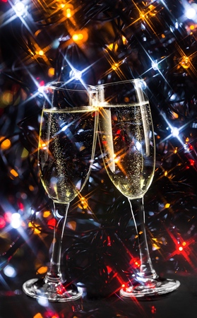 Champagne flutes on black backgroundの写真素材