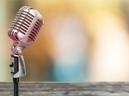 Microphone on abstract blurred of speech in seminar room or speaking conference hall light, Event Backgroundの写真素材