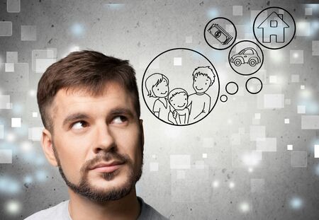 portrait of young man thinkingの写真素材