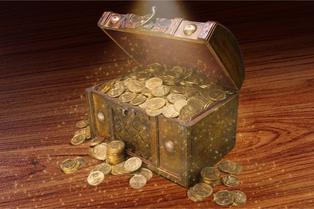 Open treasure chest filled with gold coinsの写真素材