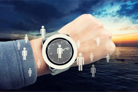 Human resources officer choose employee standing out of the crowd. Select team leader concept. Male hand click on man icon. Negative space in left side, blue background.の写真素材