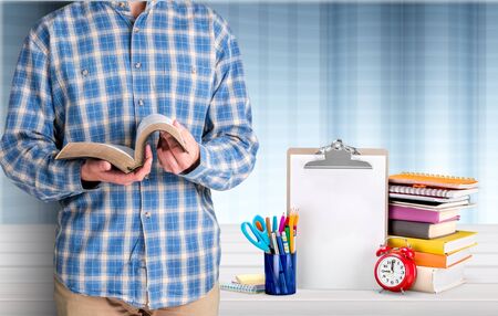 Young teacher in school classroomの写真素材