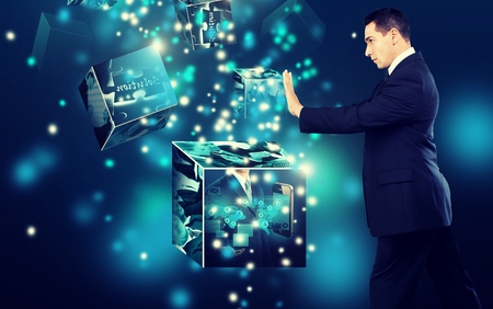 Stock image of businessman pushing a giant stack of documents isolated on white backgroundの写真素材