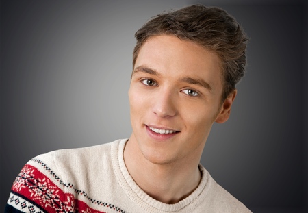 Close-up of a young man smiling
