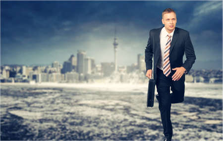 Running businessmanの写真素材