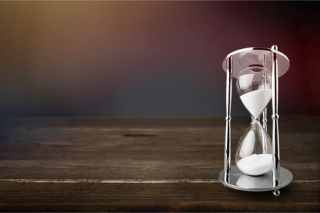 Hourglass on table