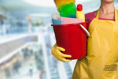 Cleaning lady with a bucket and cleaningの写真素材