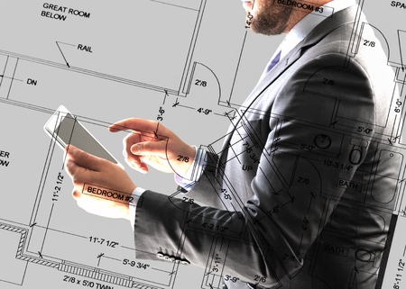 Man engineer using a digital tabletの写真素材