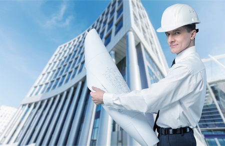 Male engineer with plan