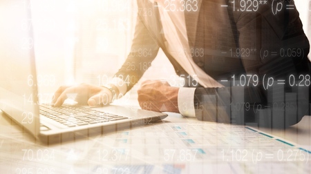 business man hand working on laptop computer with digital layer business graph information diagram...